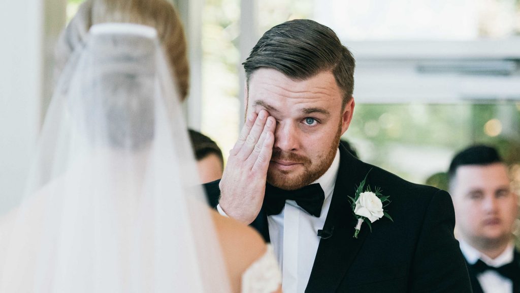 Groom cries during his wife's wedding vows
